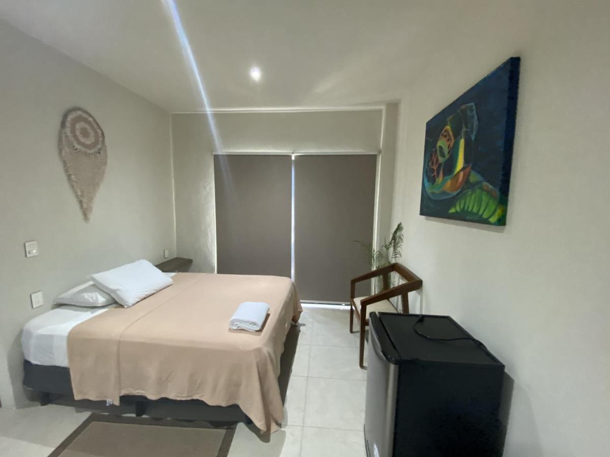 Cuxos Hotel Beachfront 女人岛 外观 照片