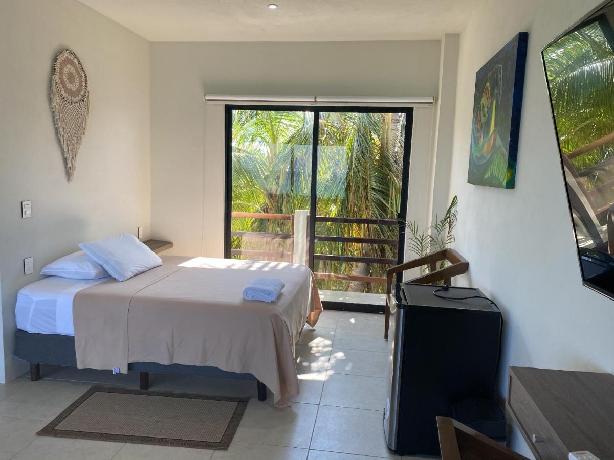 Cuxos Hotel Beachfront 女人岛 外观 照片